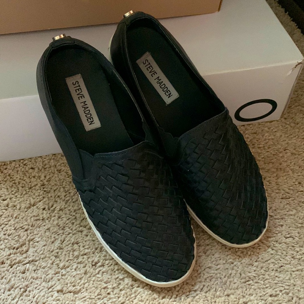 Black Steve Madden slip ons. Size 7.5
